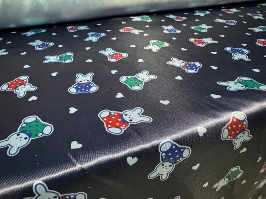 Silky satin woven dress fabric, per metre - bunny rabbit print - navy blue