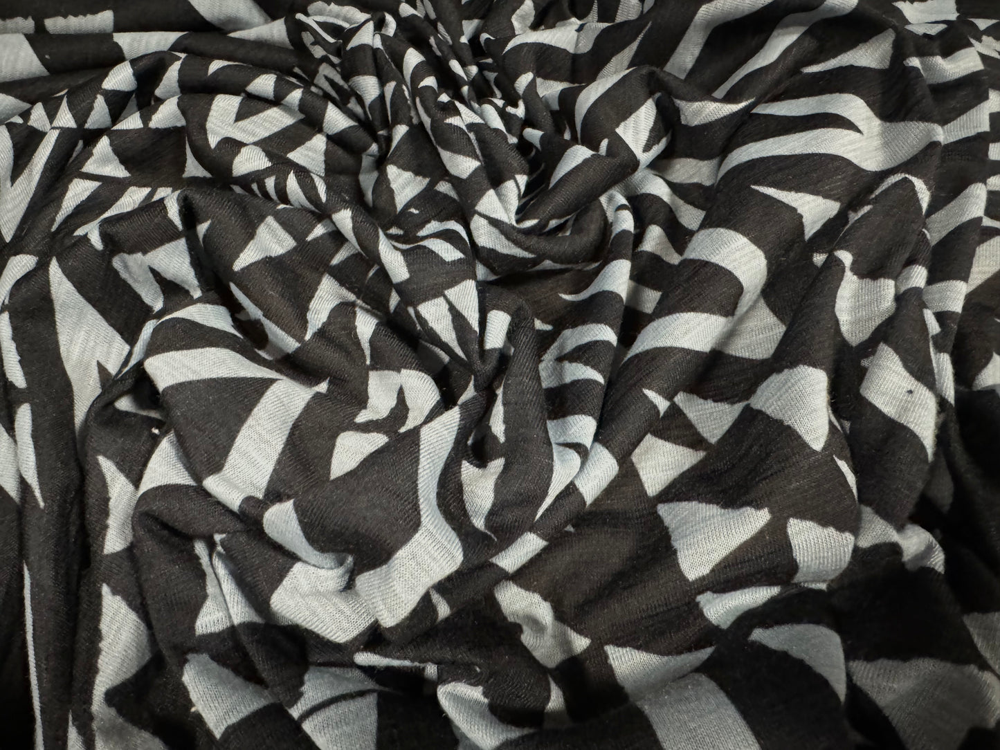 Soft handle lightweight single jersey fabric, per metre - tribal tattoo print - grey & black