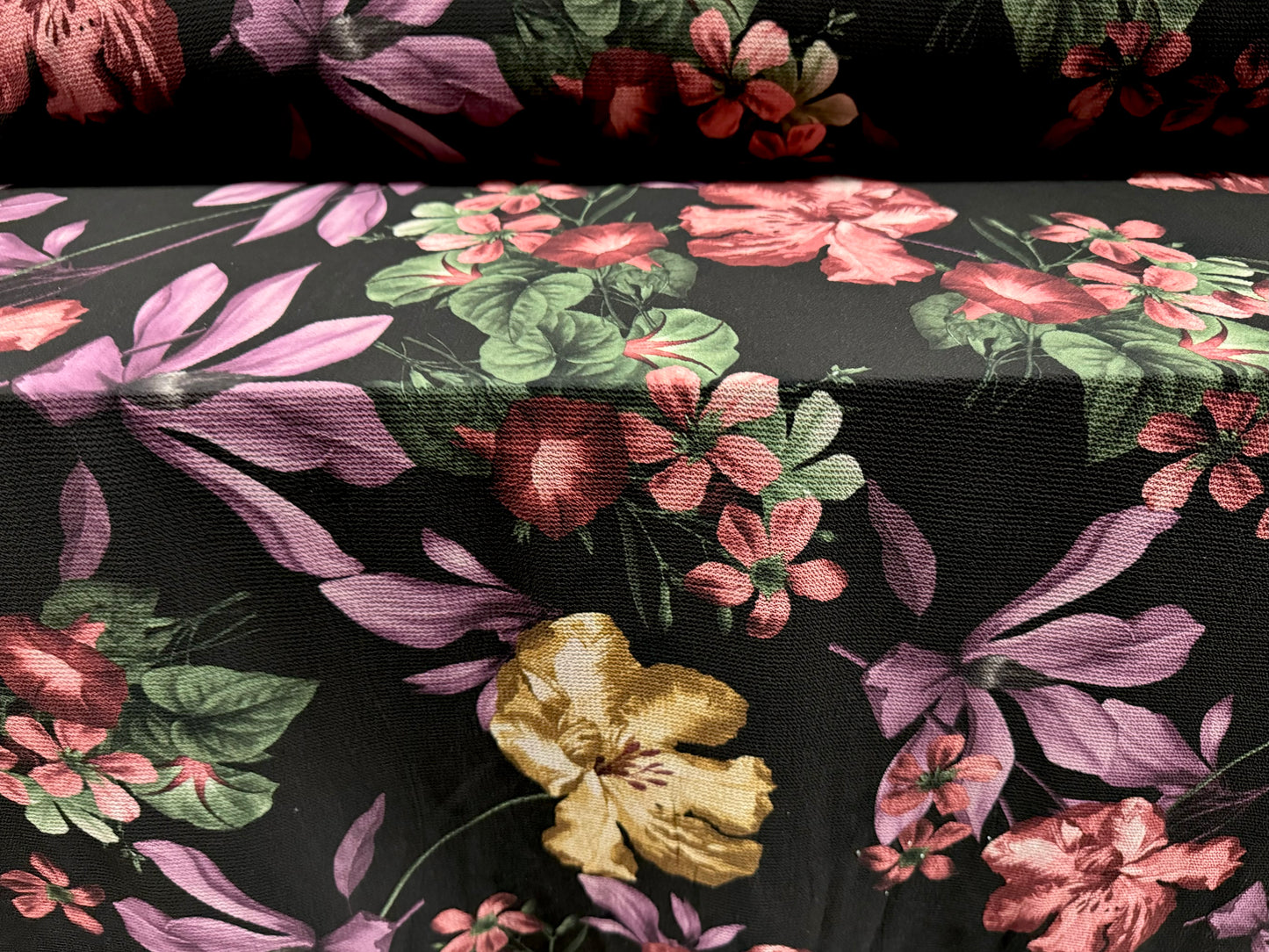 Bubble crepe stretch woven dress fabric, per metre - lilies floral print - black violet & beige