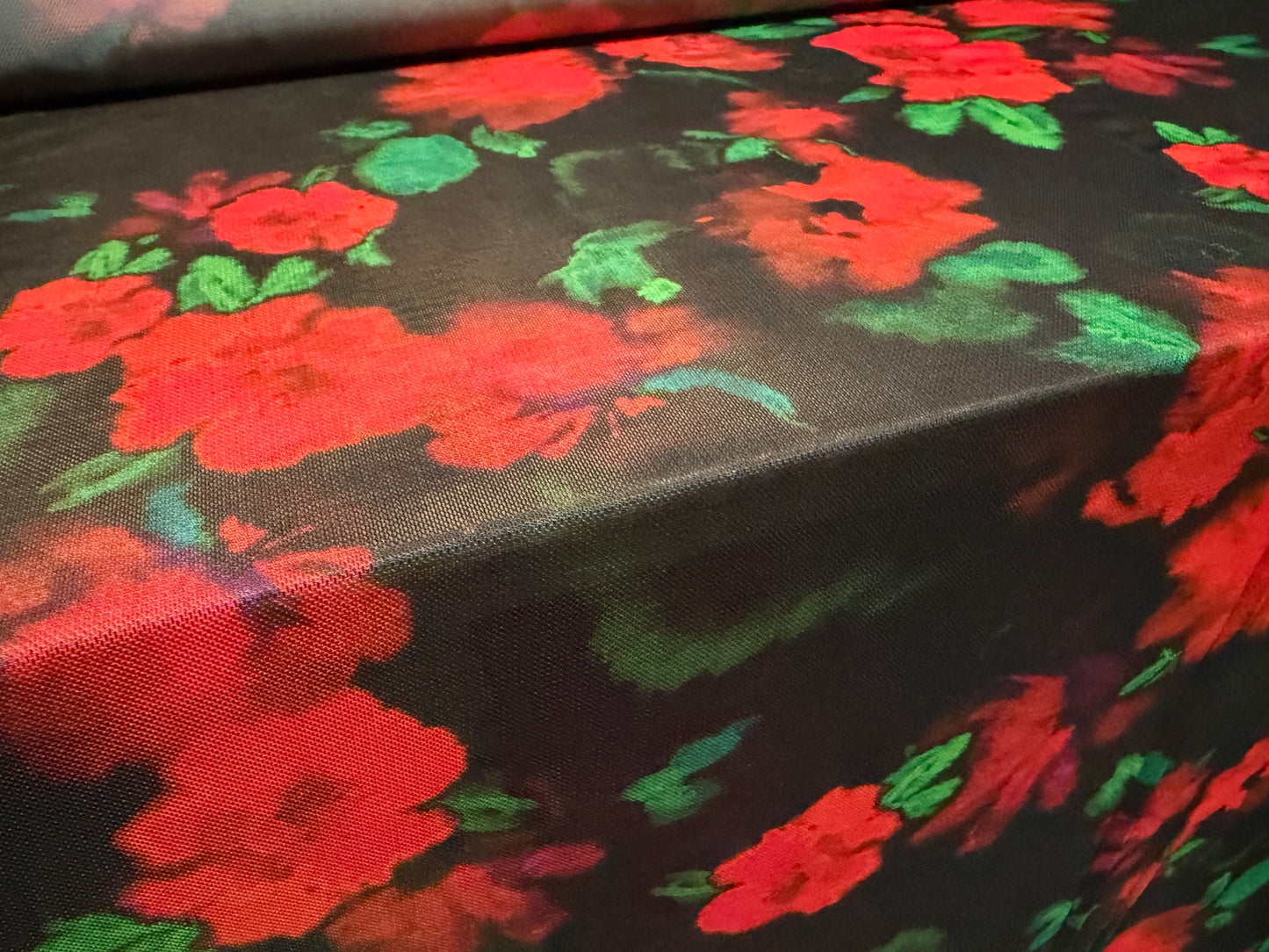 Power mesh net stretch spandex fabric, per metre - soft focus floral print - black red & green