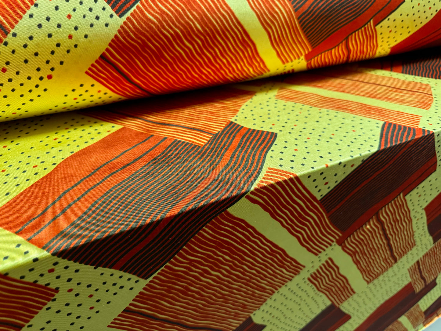 Soft touch stretch spandex single jersey fabric, per metre - geometric spots and shapes print - citrus & rust