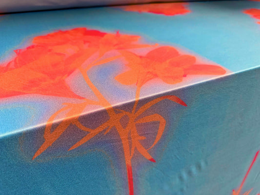 Soft touch stretch spandex single jersey fabric, per metre - stylised flower print - sky blue & orange