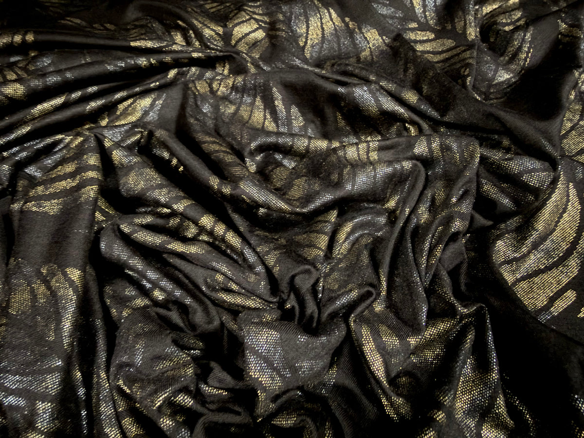 Metallic viscose spandex stretch jersey fabric, per metre - leaf print - black & old gold