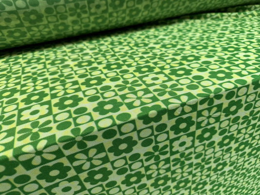 Power mesh net stretch spandex fabric, per metre - Geometric daisy flower print - green lemon & cream