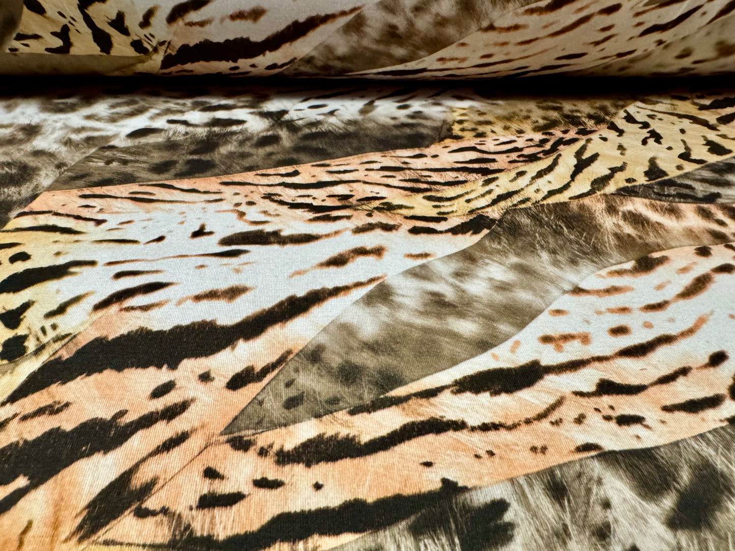 Stretch spandex interlock jersey fabric, per metre - animal collage print - beige & gold