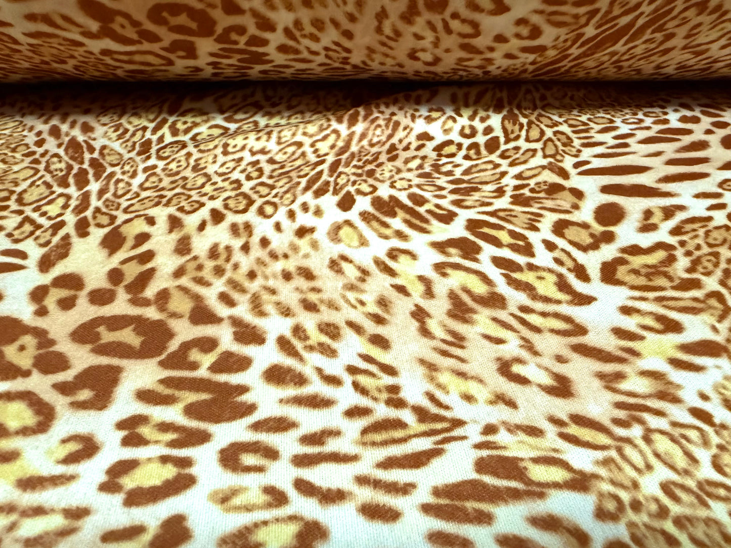 Single jersey fashion fabric, per metre - stylised animal print - gold