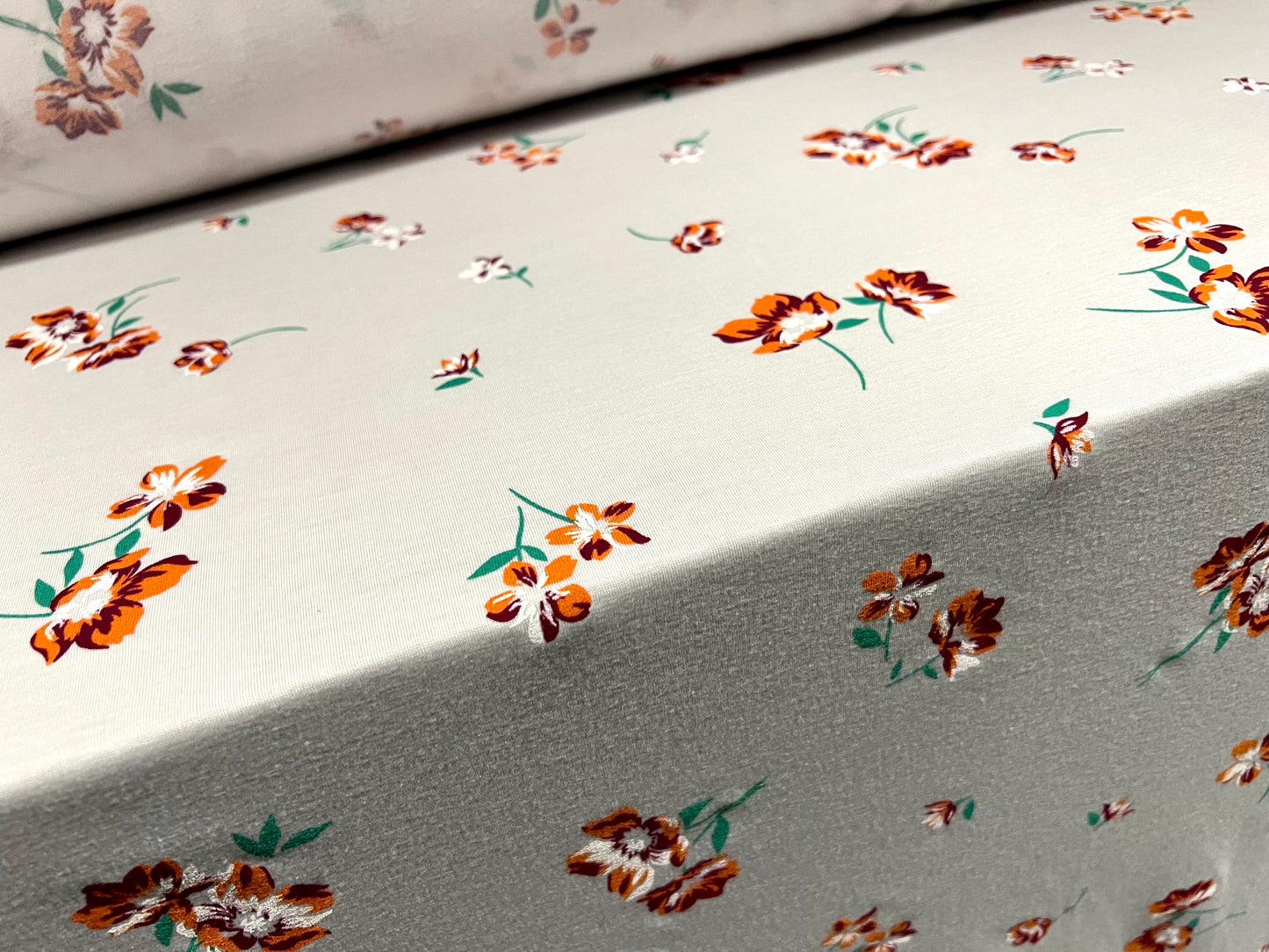 Soft handle single jersey fabric, per metre - flower print - pale grey & orange