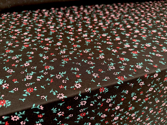Viscose spandex stretch single jersey fabric, per metre - small ditsy flower print - black & pink