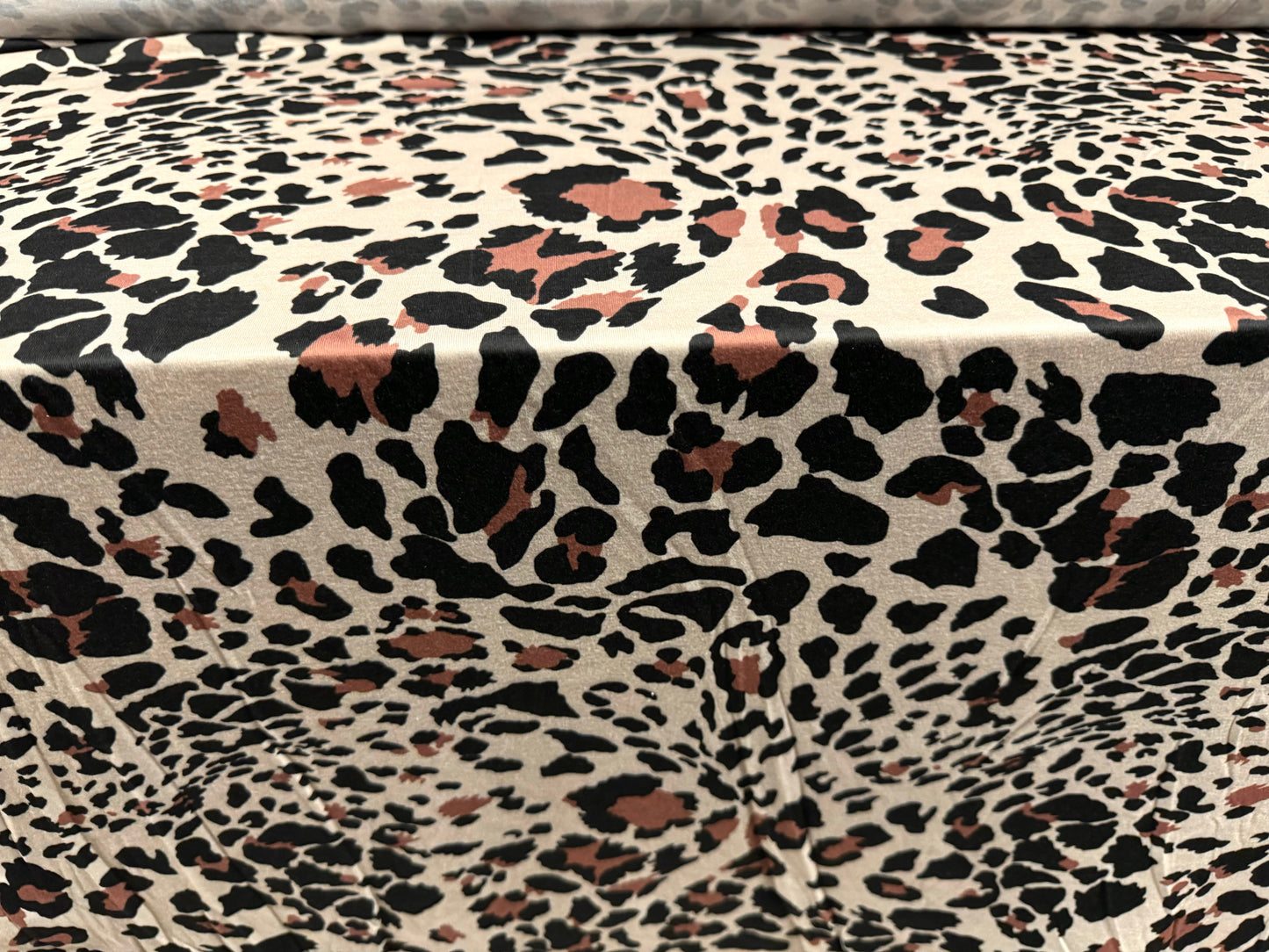 Soft handle stretch single jersey fashion fabric, per metre - stylised leopard print - dark cream