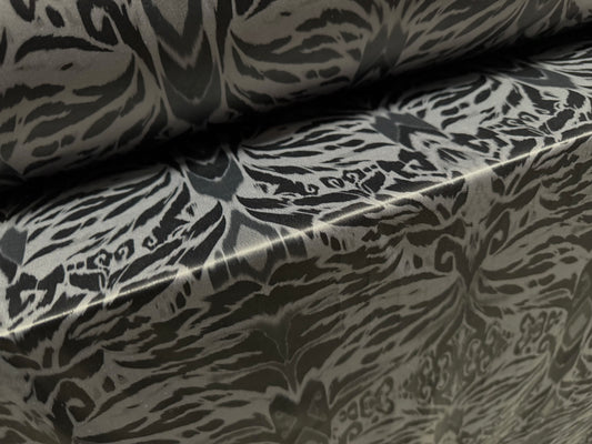 Ciré p.u. coated stretch single jersey fabric, per metre - psychedelic damask print - grey & black