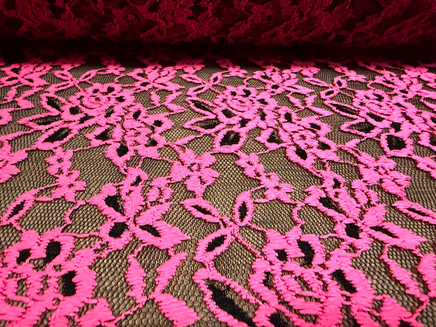 Embroidered stretch lace fabric with scalloped selvedge, per metre - floral - fluorescent pink