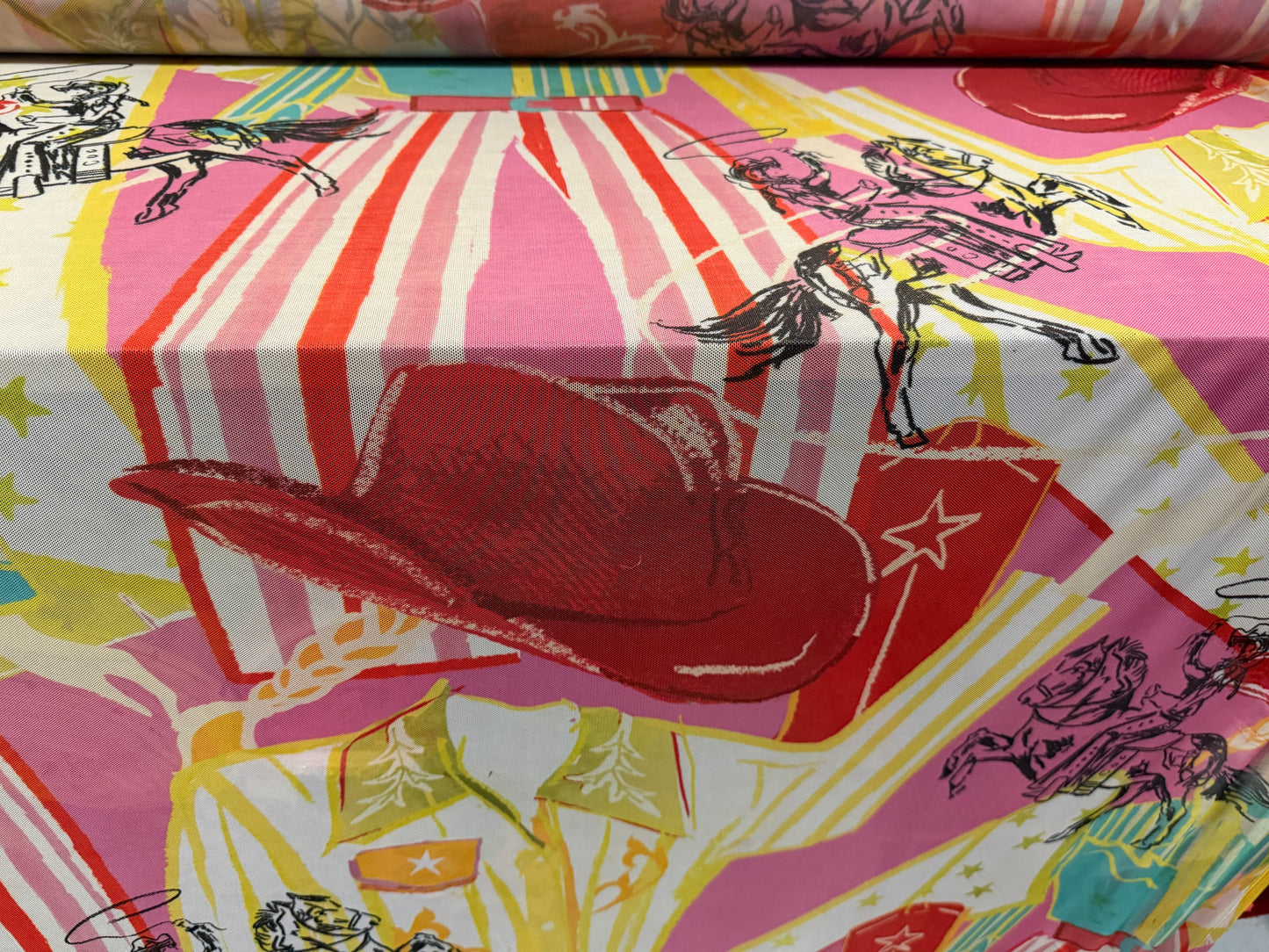 Power mesh net stretch spandex fabric, per metre - cowgirl rodeo print - multicolour
