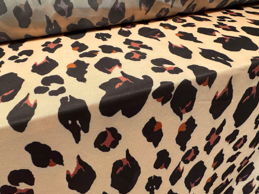 Power mesh net stretch spandex fabric, per metre - animal print - peach cream