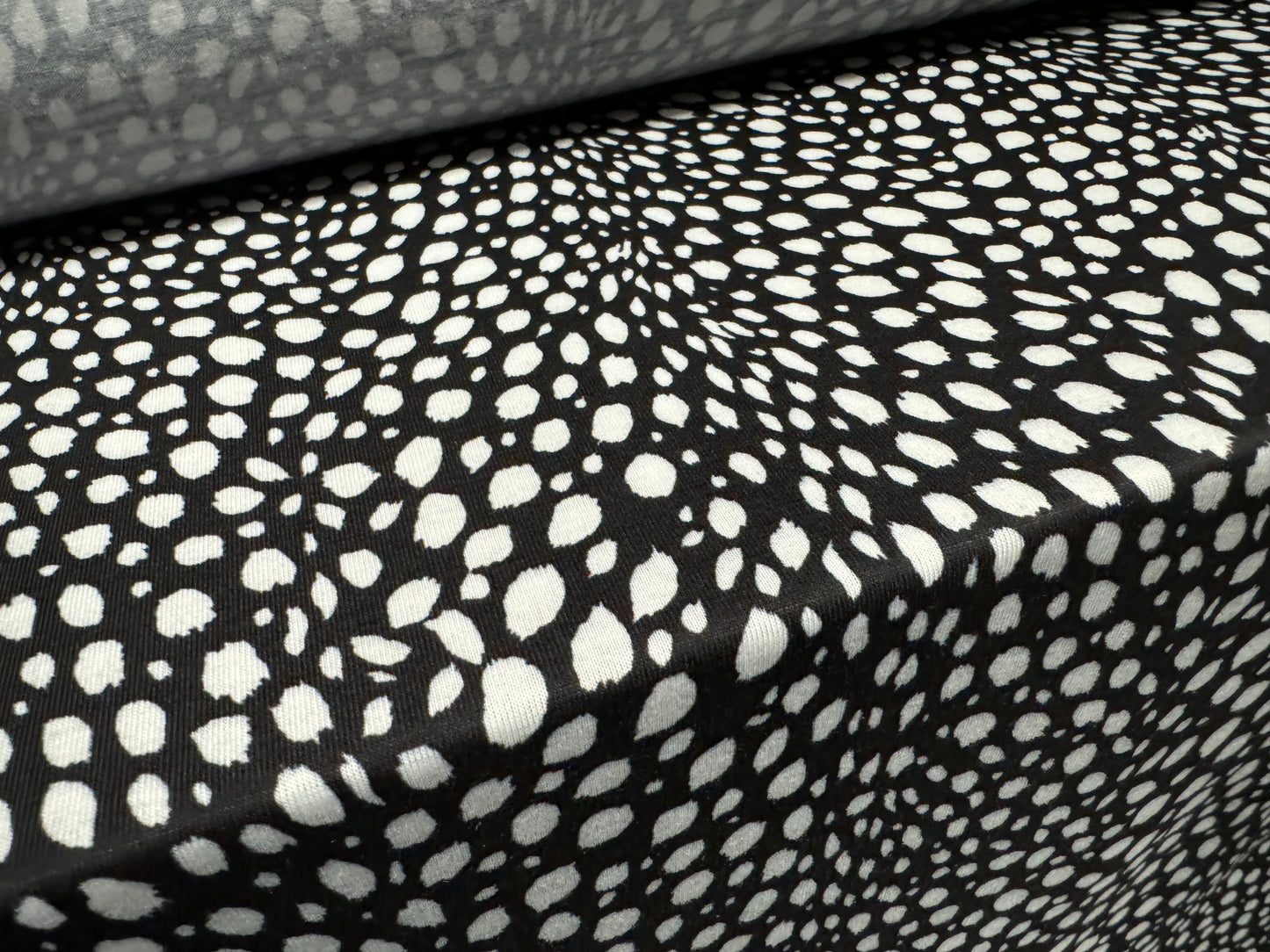 Soft handle single jersey fashion fabric, per metre - stylised Dalmatian print - black & white