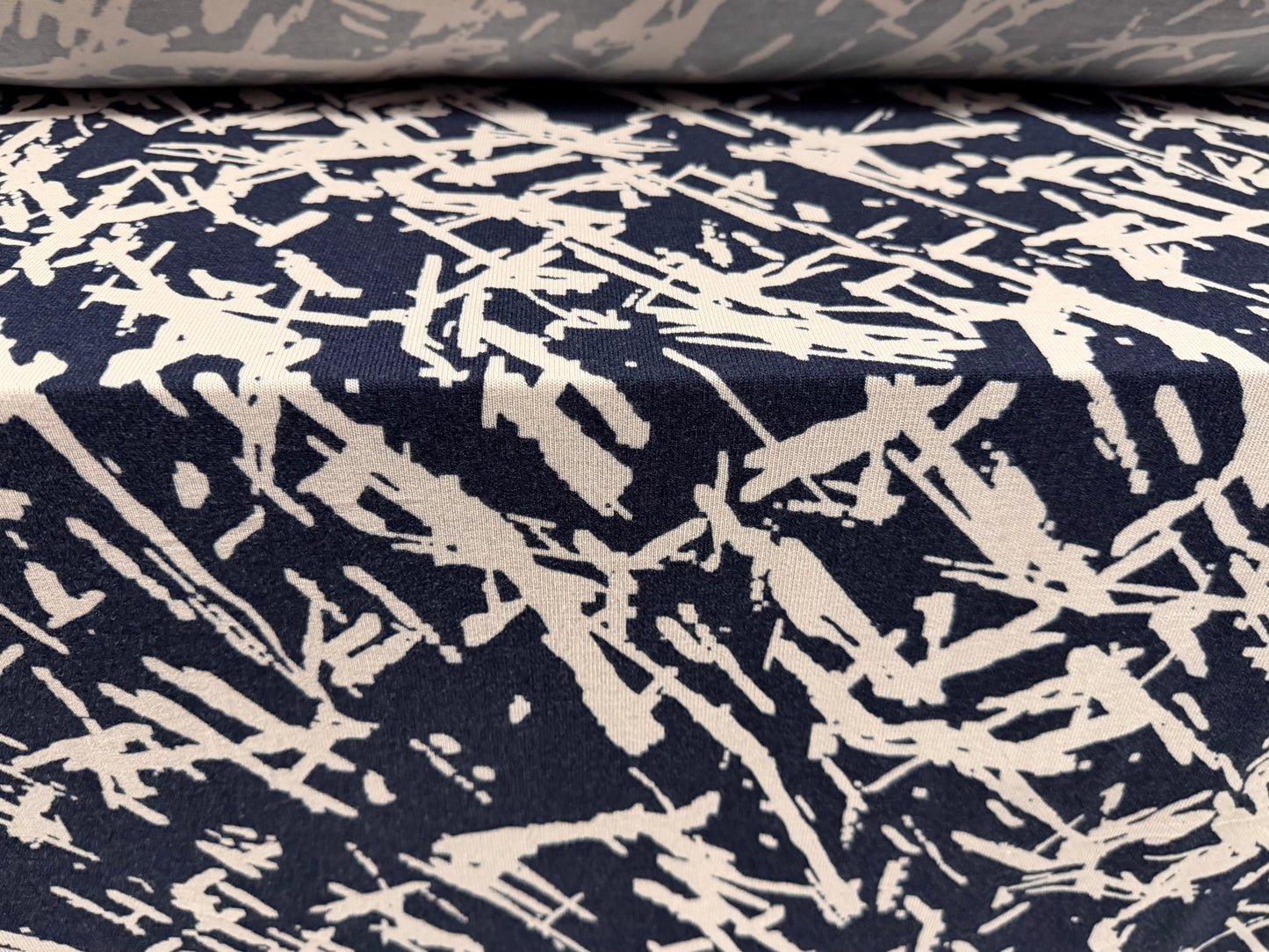 Lambswool stretch jersey knit fabric, per metre - abstract print - navy & blush