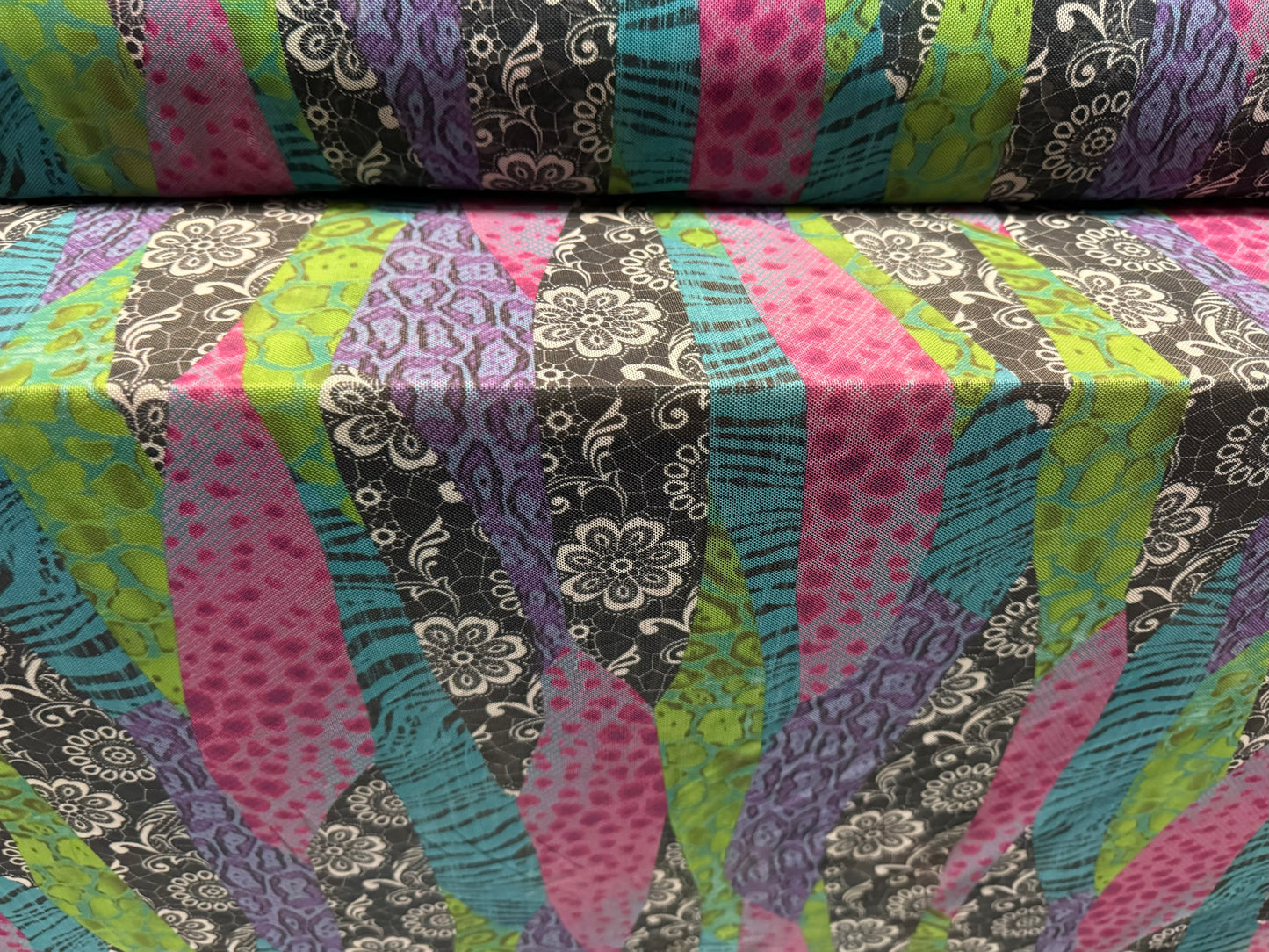 Power mesh net sheer stretch spandex fabric, per metre - lace and animal print fusion - multicolour