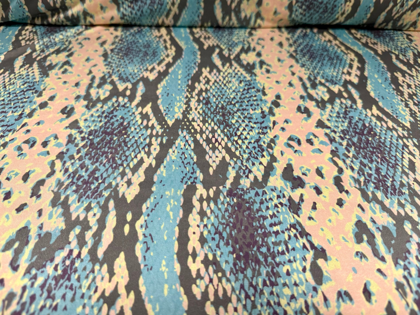 Soft touch stretch spandex jersey fabric, per metre - stylised snakeskin print - blue & cream