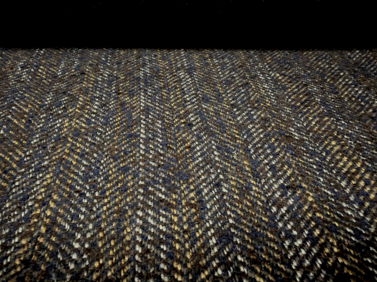 Wool bouclé fabric, per metre - herringbone - black & mustard