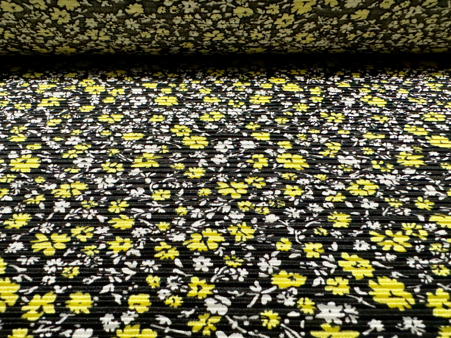 Stretch plissé pleated dress fabric, per metre - ditsy flower print - black & yellow