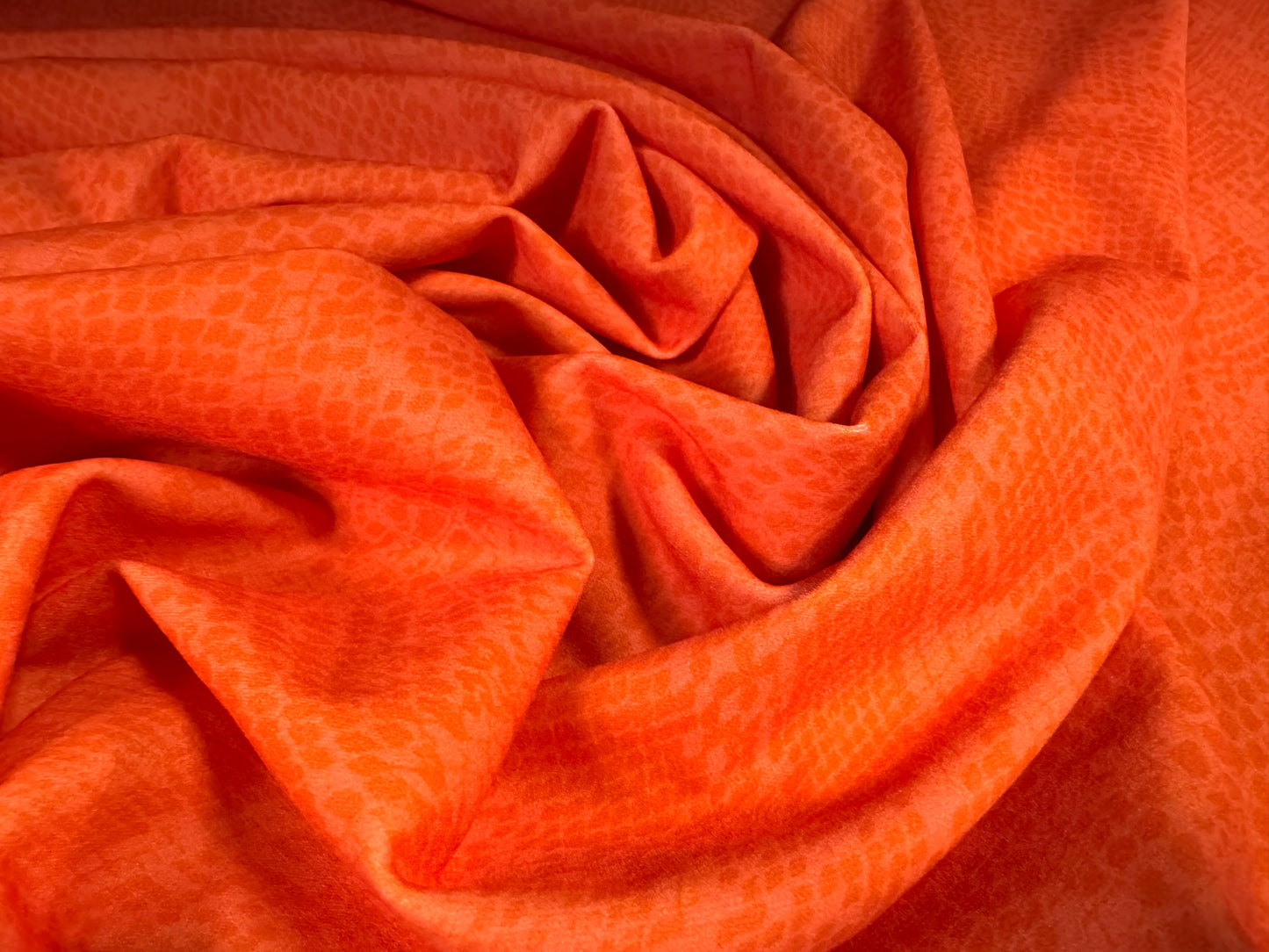 Scuba crepe stretch spandex jersey dress fabric, per metre - snakeskin print - orange