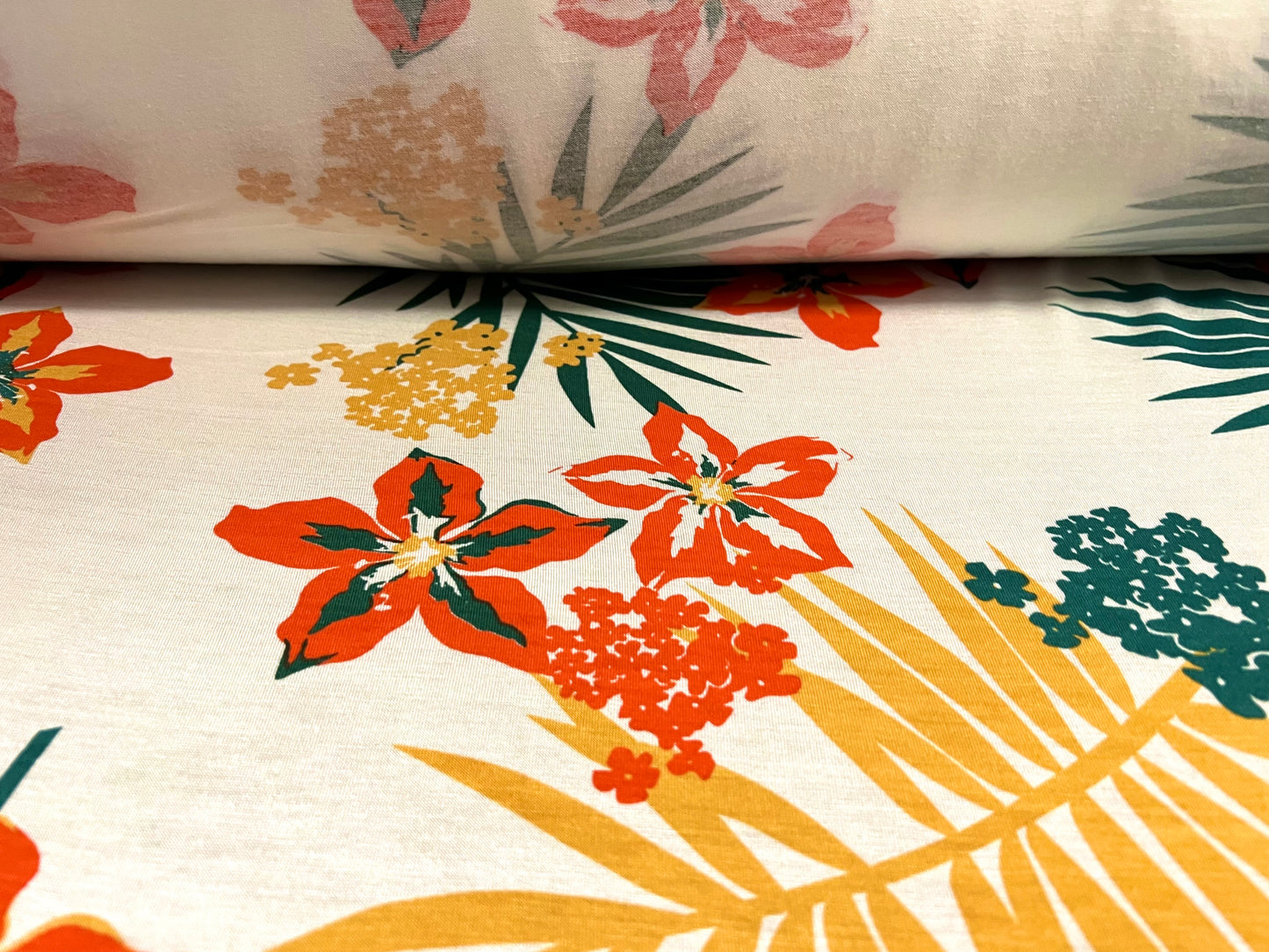 Viscose spandex stretch jersey fabric, per metre - Hawaiian tropical flower print - ivory green & orange