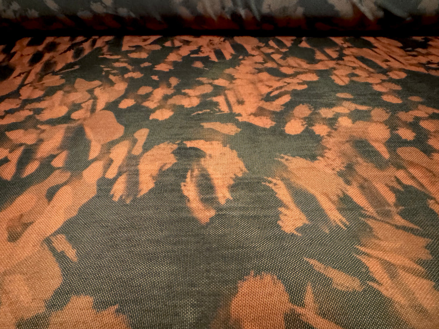 Power mesh net stretch spandex fabric, per metre - abstract print - black & rust
