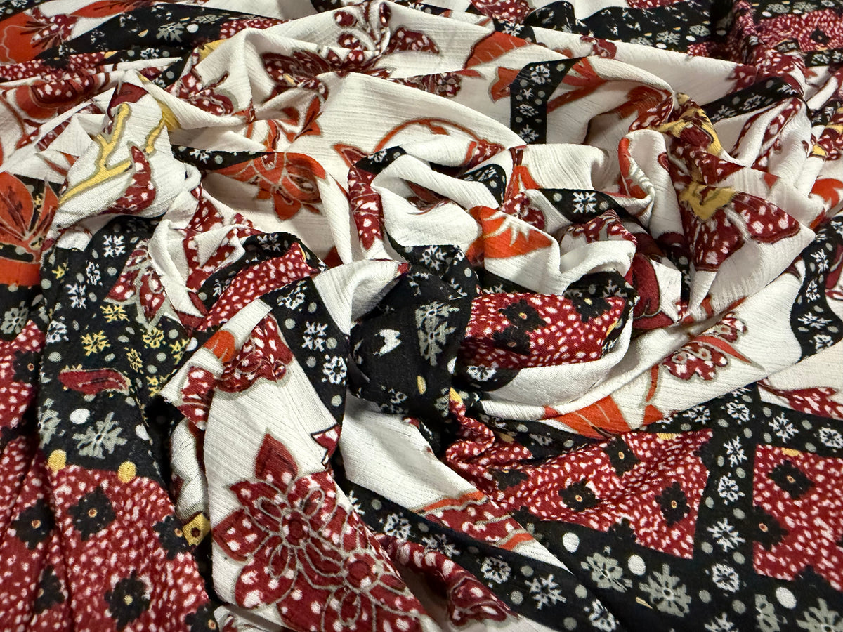Stretch Vienna crepe dress fabric with spandex, per metre - floral double border print - wine terracotta & black