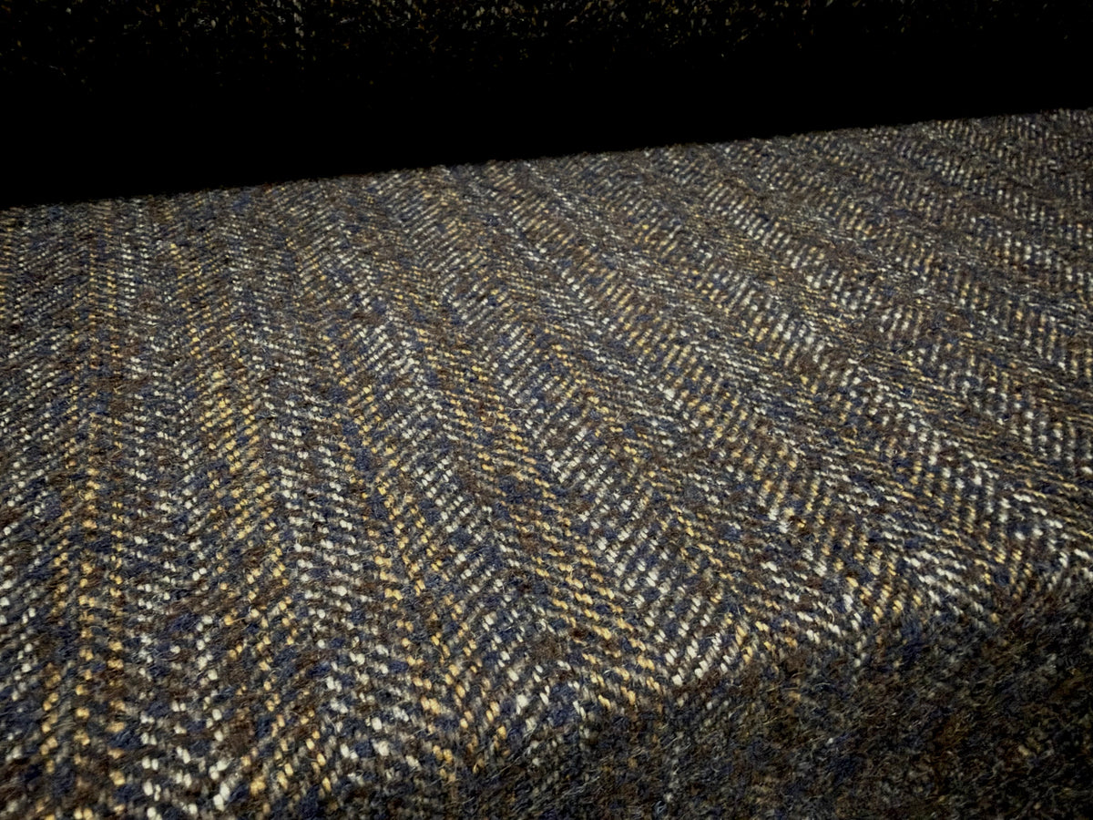 Wool bouclé fabric, per metre - herringbone - black & mustard