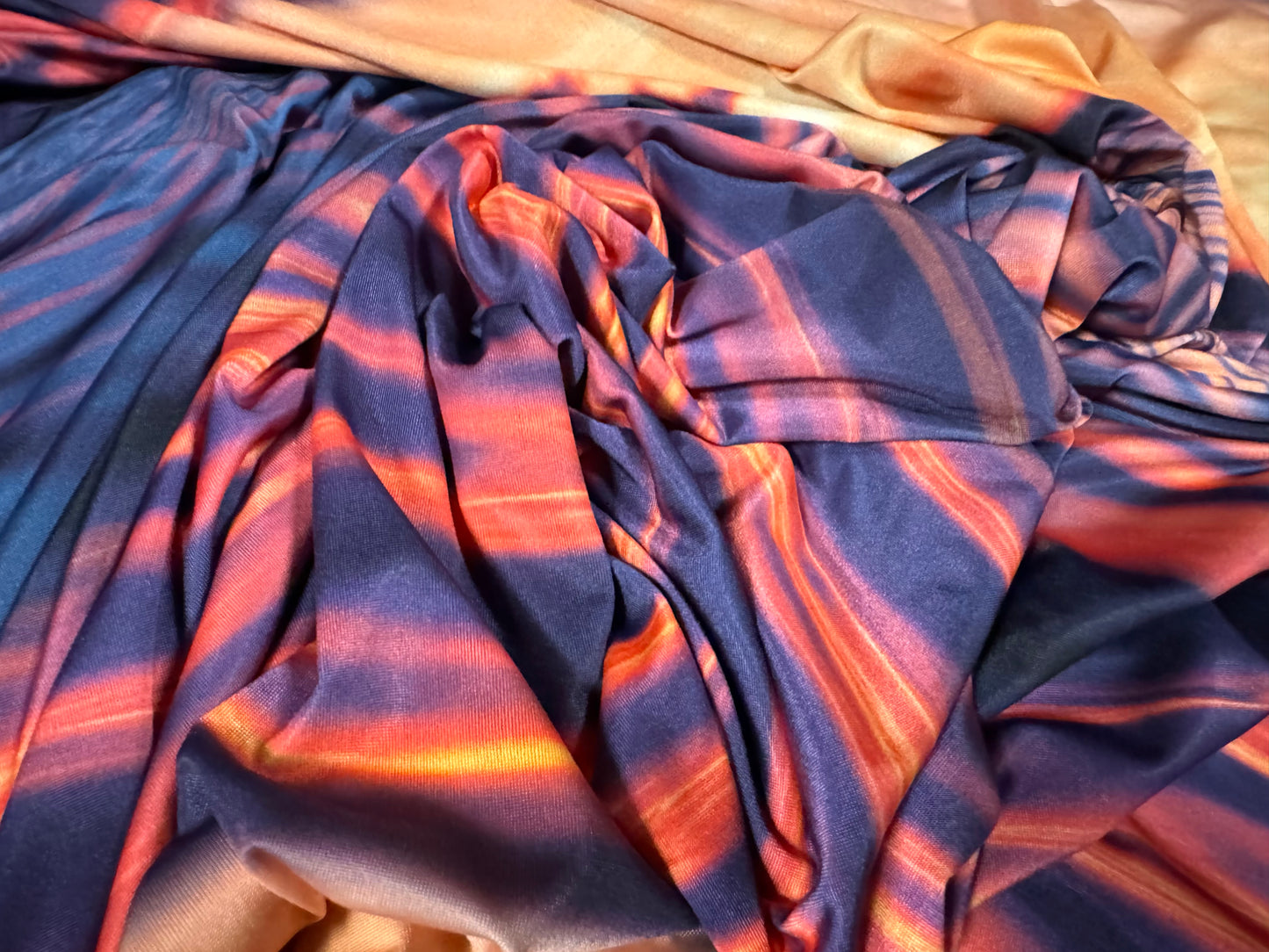 Soft touch stretch spandex single jersey fabric, per metre - Pacific sunset print - orange and purple