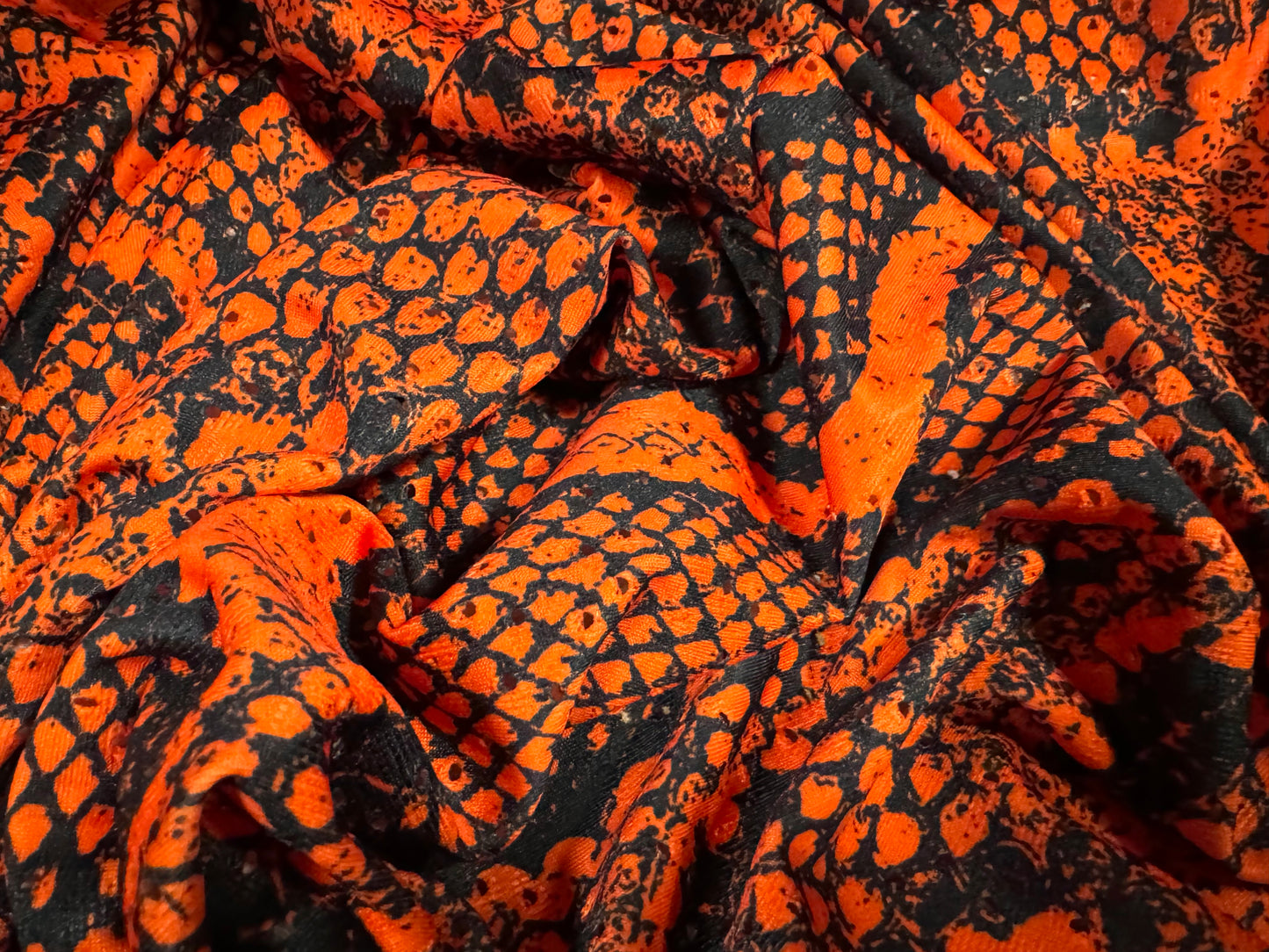 Broderie anglaise stretch spandex jersey fabric, per metre - snakeskin animal print - burnt orange