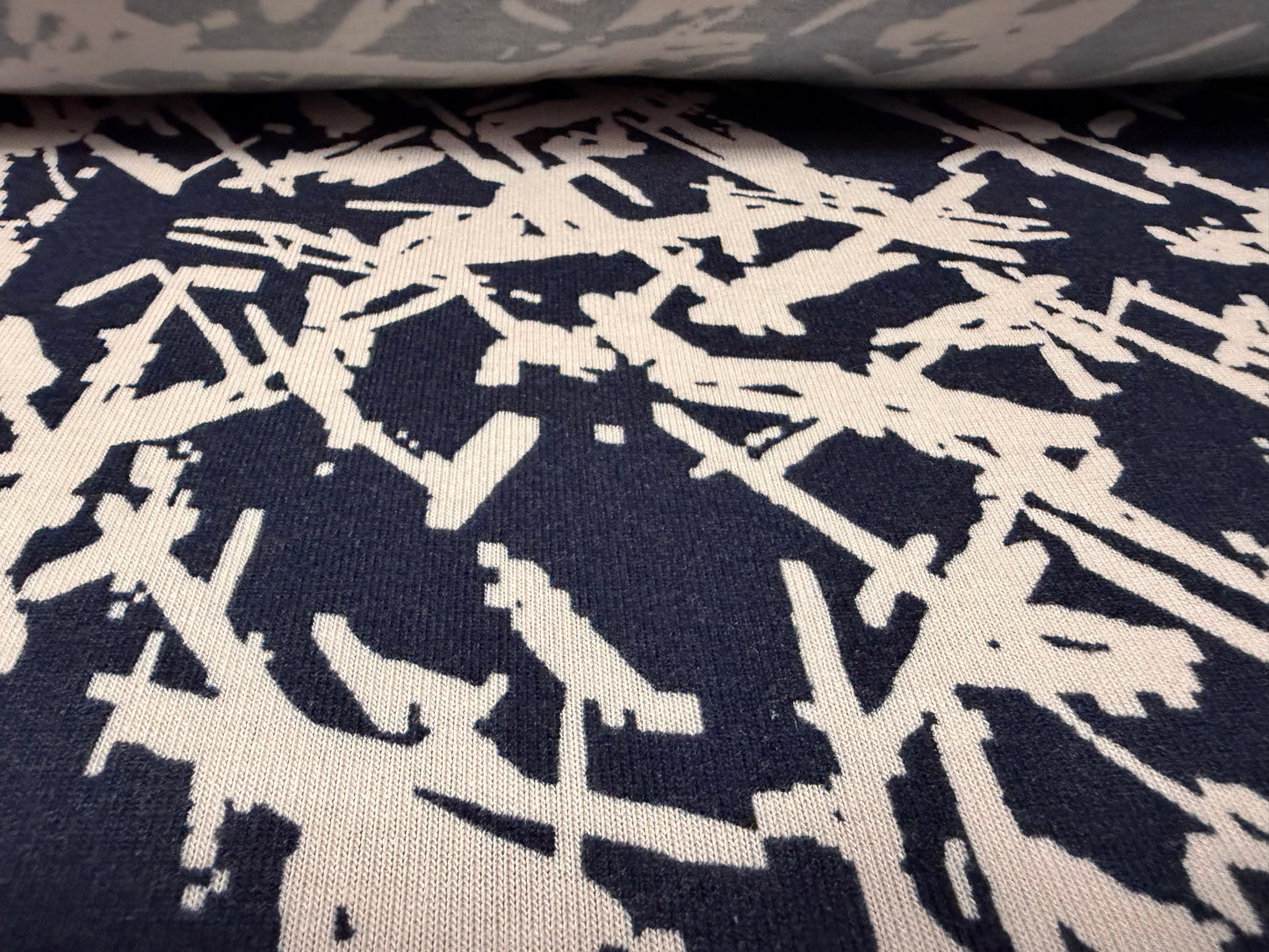 Lambswool stretch jersey knit fabric, per metre - abstract print - navy & blush