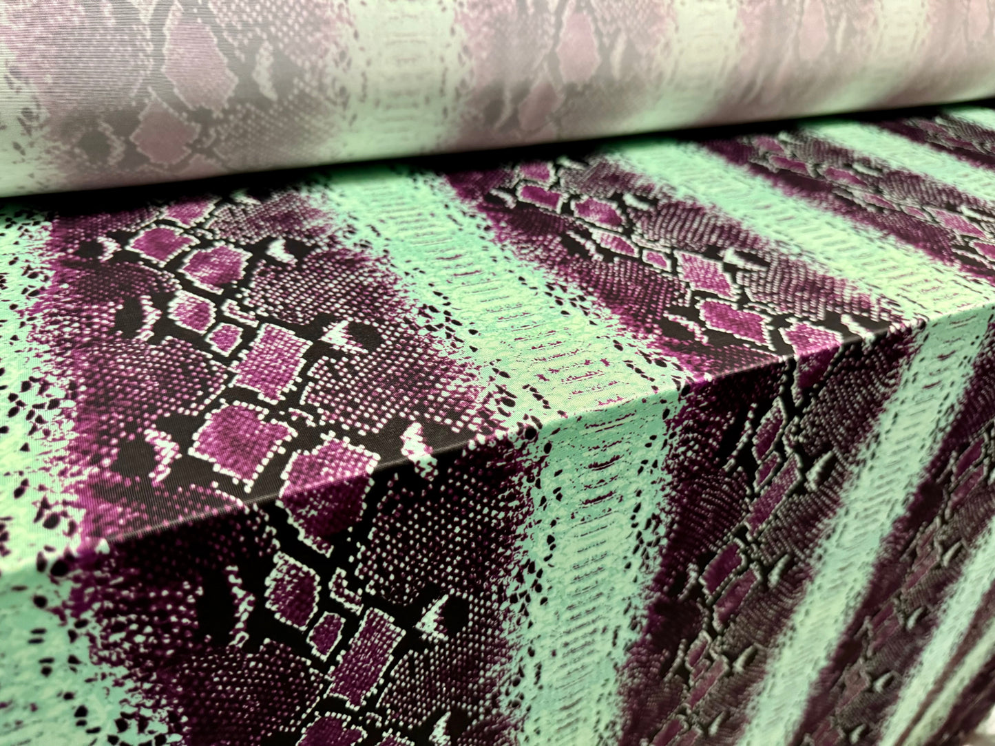 Soft touch stretch spandex single jersey fabric, per metre - snakeskin stripe print - purple & mint