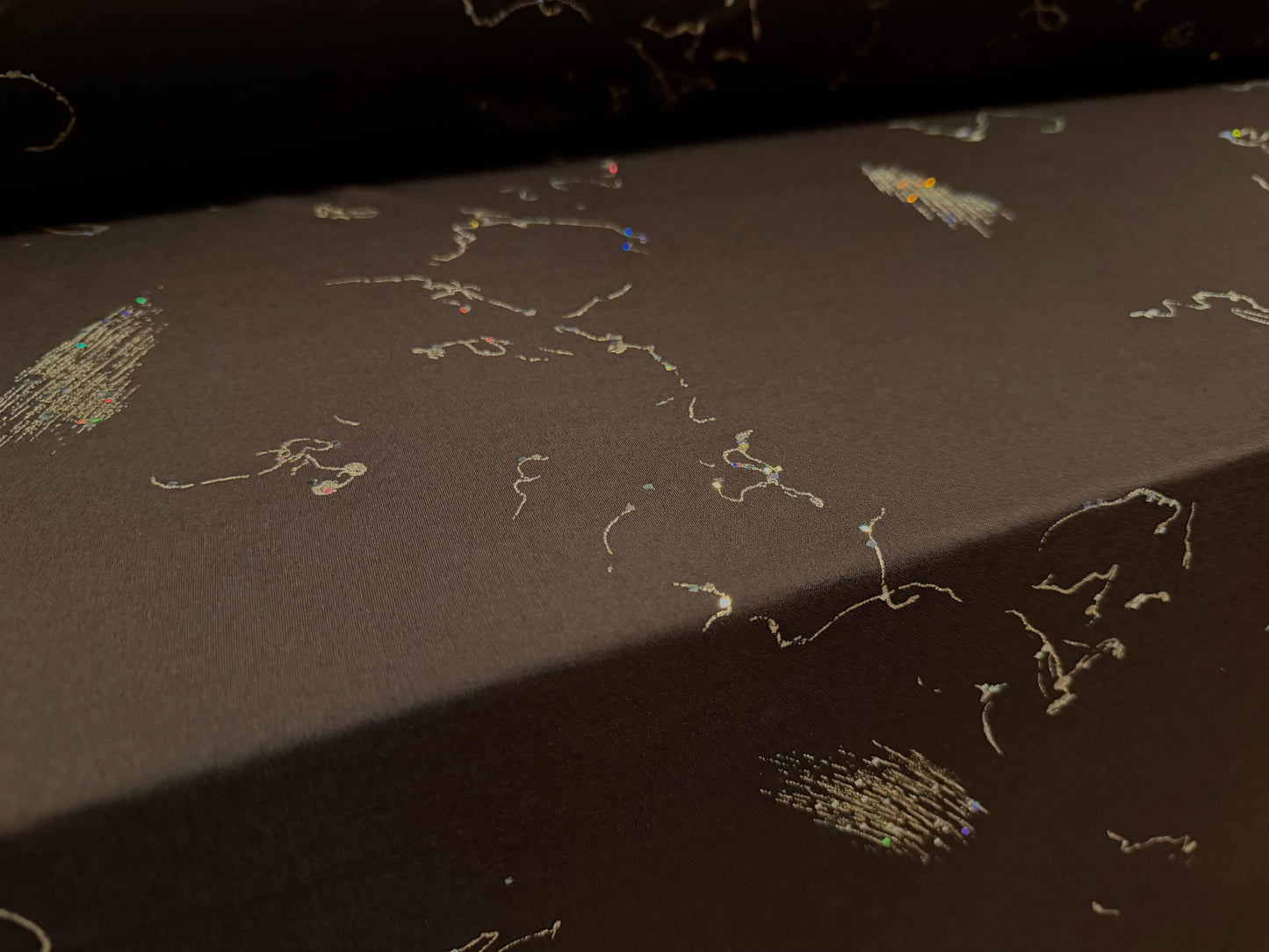 Metallic stretch single jersey fabric, per metre - abstract glitter print with sequins - dark brown & gold