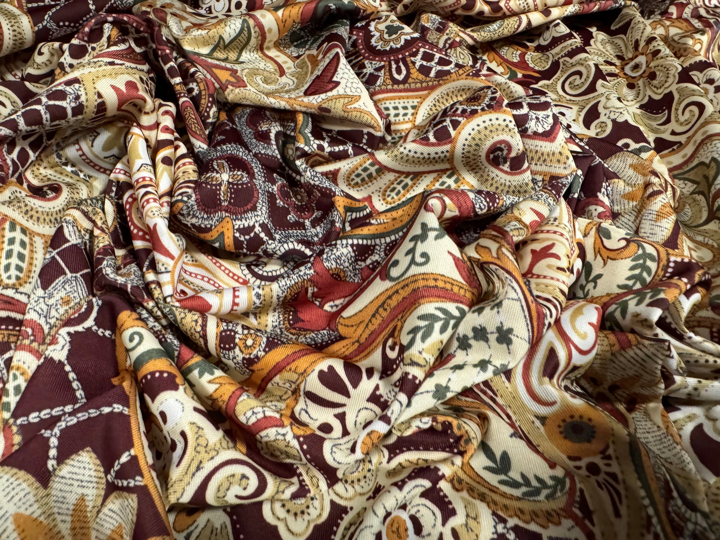 Soft touch stretch spandex single jersey fabric, per metre - paisley print - maroon & cream