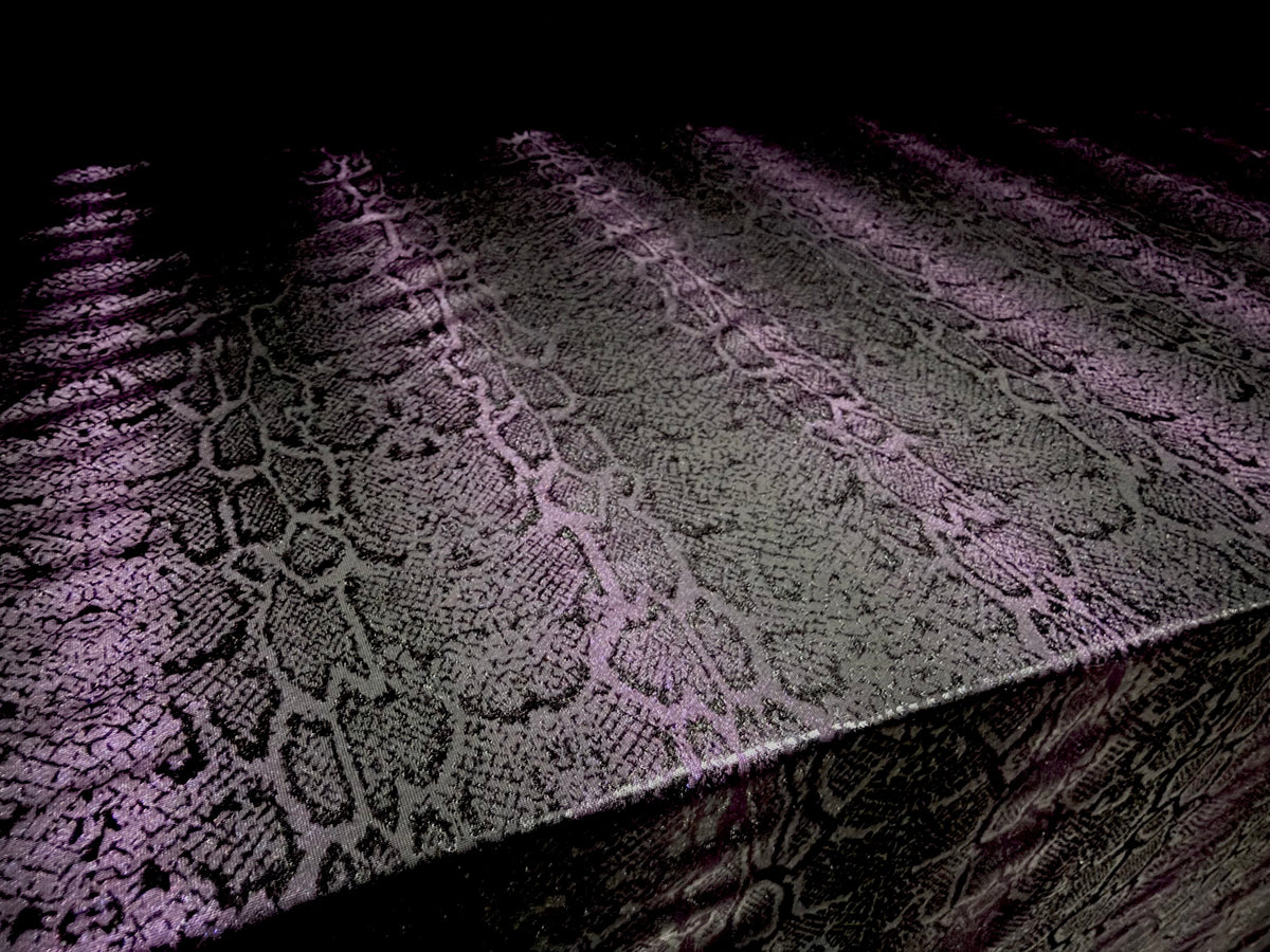 Stretch ITY jersey fabric, per metre - embossed snakeskin print - black & purple