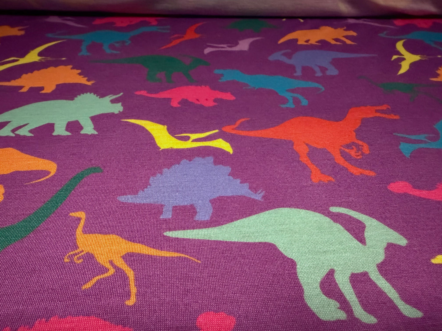 Soft handle single jersey fabric, per metre - dinosaur print - purple