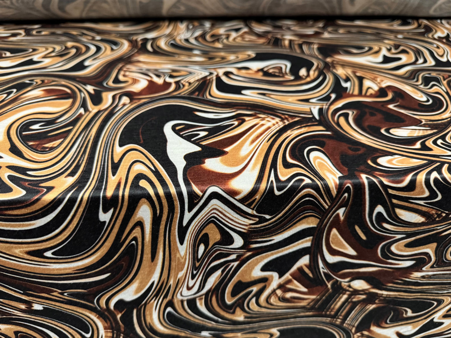 Soft handle single jersey fashion fabric, per metre - 60s swirl print - brown & beige