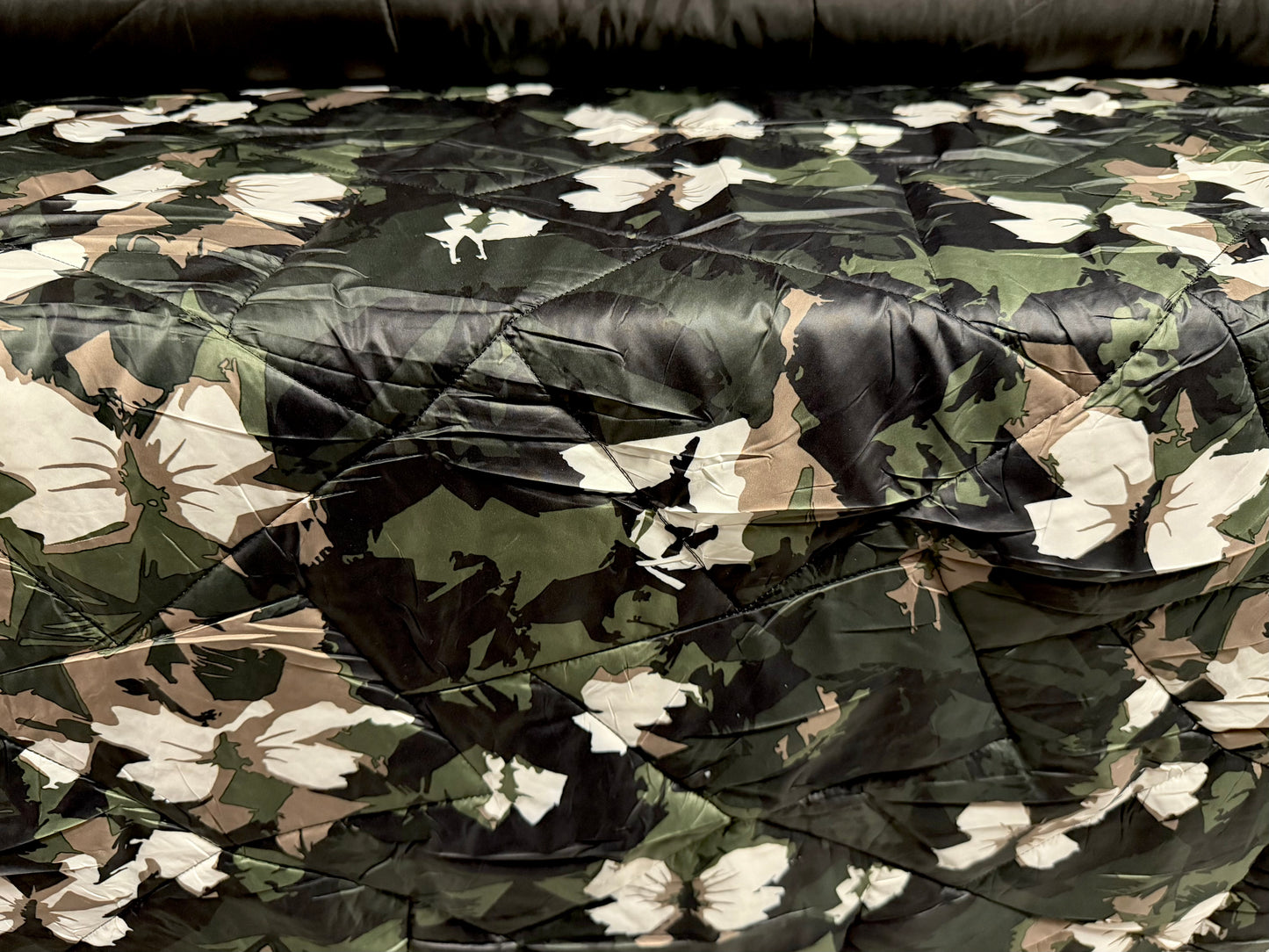 Quilted double sided fabric, per metre - stylised floral print - khaki beige & black