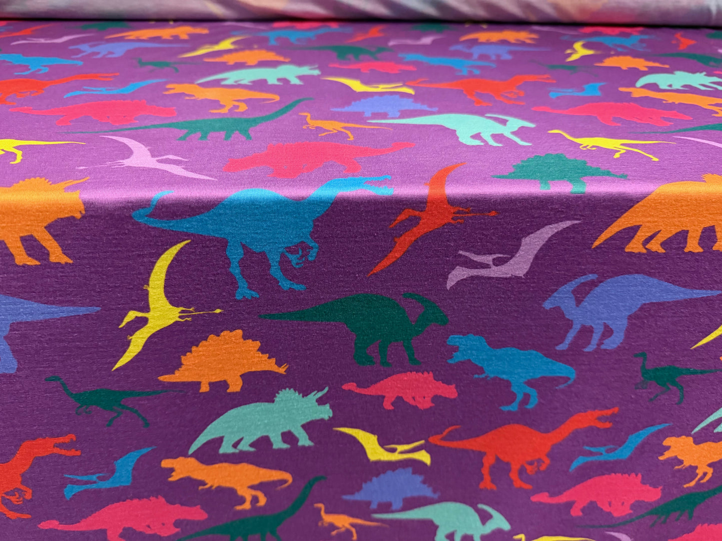 Soft handle single jersey fabric, per metre - dinosaur print - purple