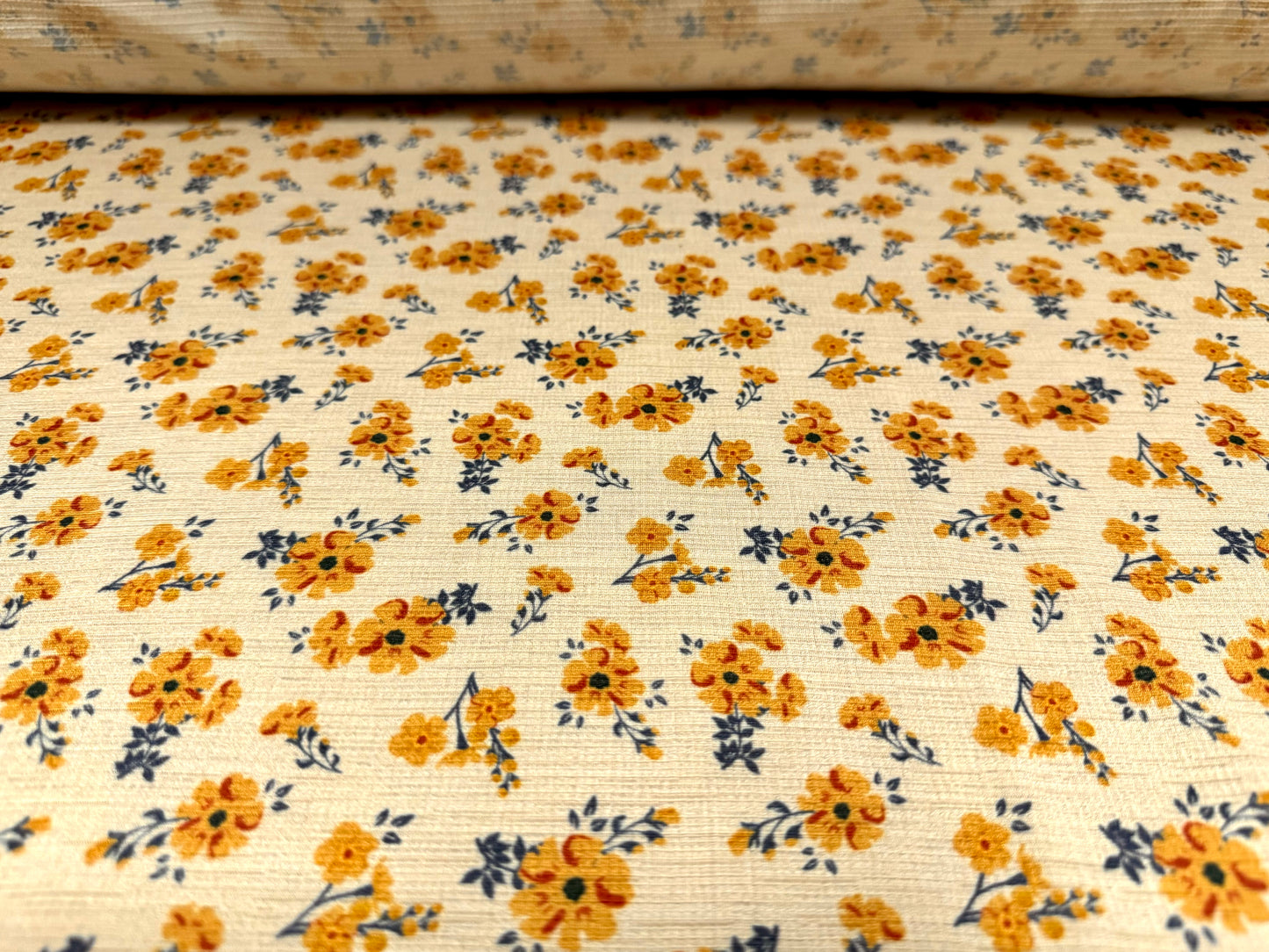 Stretch cheesecloth dress fabric, per metre - ditsy flower print - cream mustard & blue