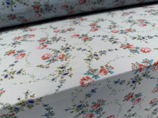 Power mesh net stretch spandex fabric, per metre - rambling rose print - sky blue