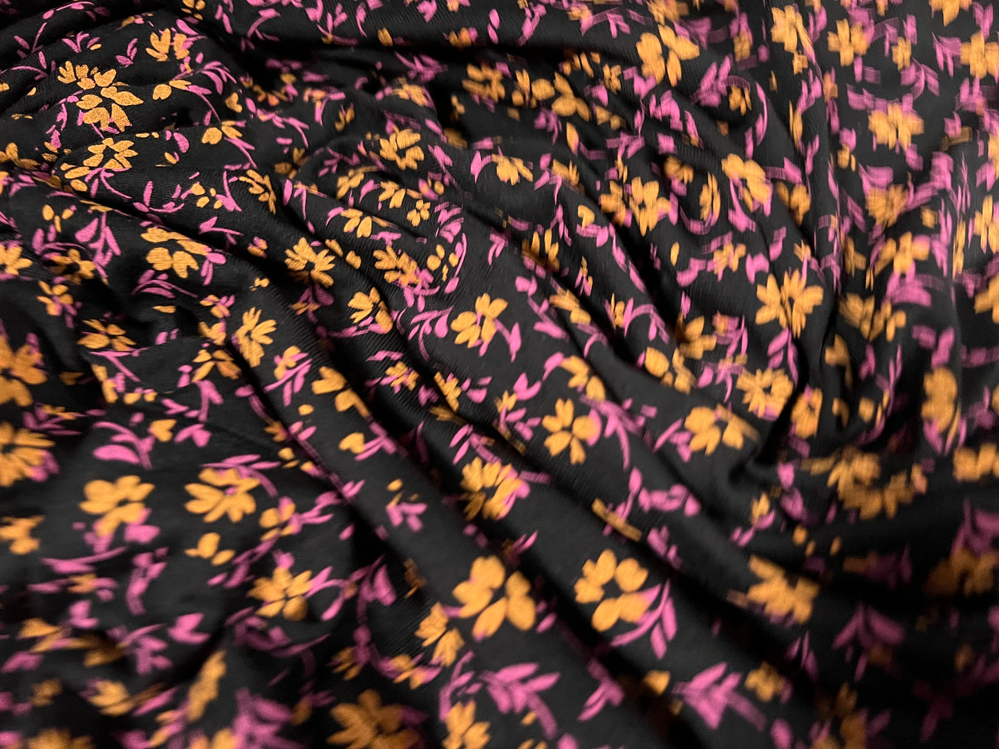 Viscose spandex stretch single jersey fabric, per metre - ditsy flower print - black magenta & saffron