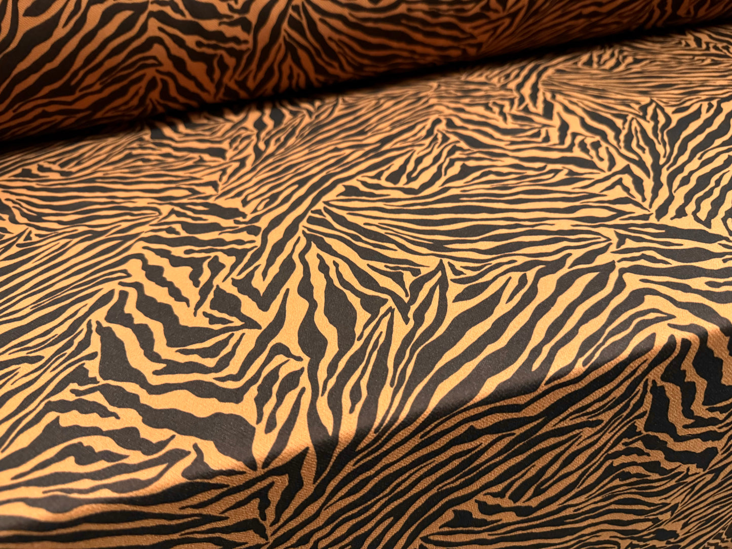 Scuba textured ‘Liverpool’ stretch spandex jersey fabric, per metre - zebra print - jasper orange