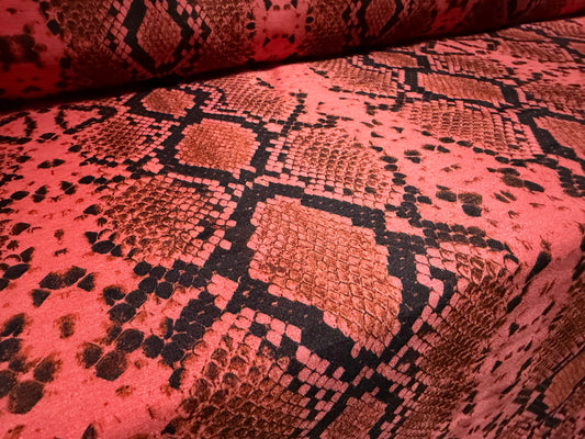Shantung satin faux silk woven dress fabric, per metre - snakeskin print - coral