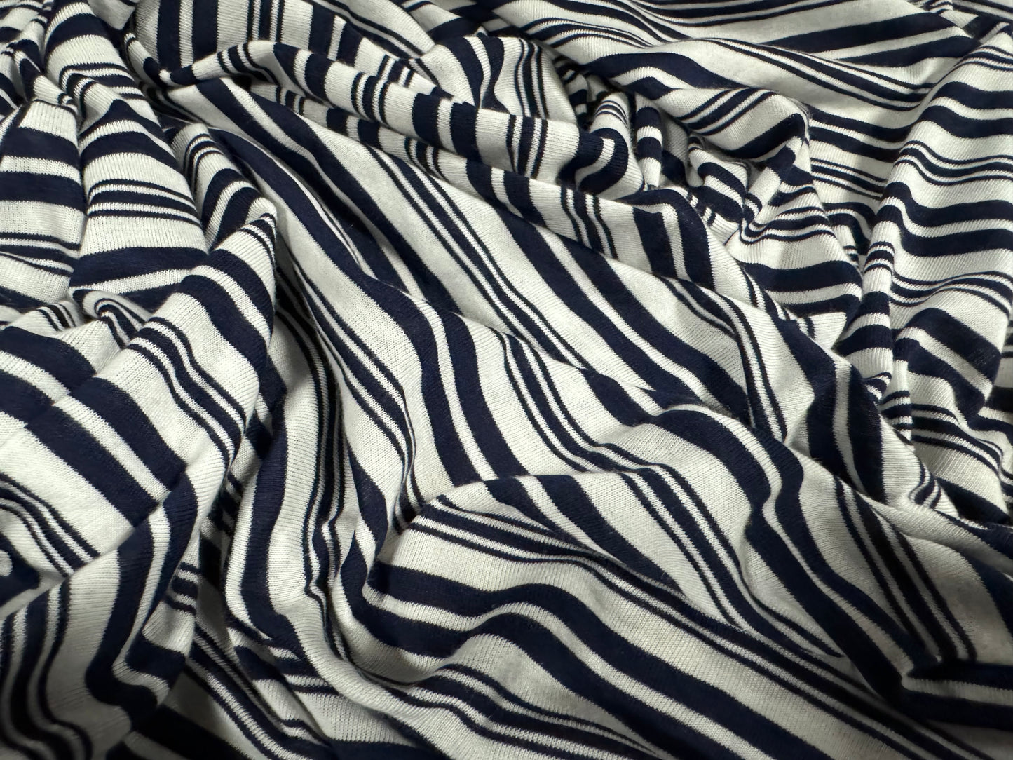 Viscose single jersey fabric, per metre - variated stripe - dark navy blue & white