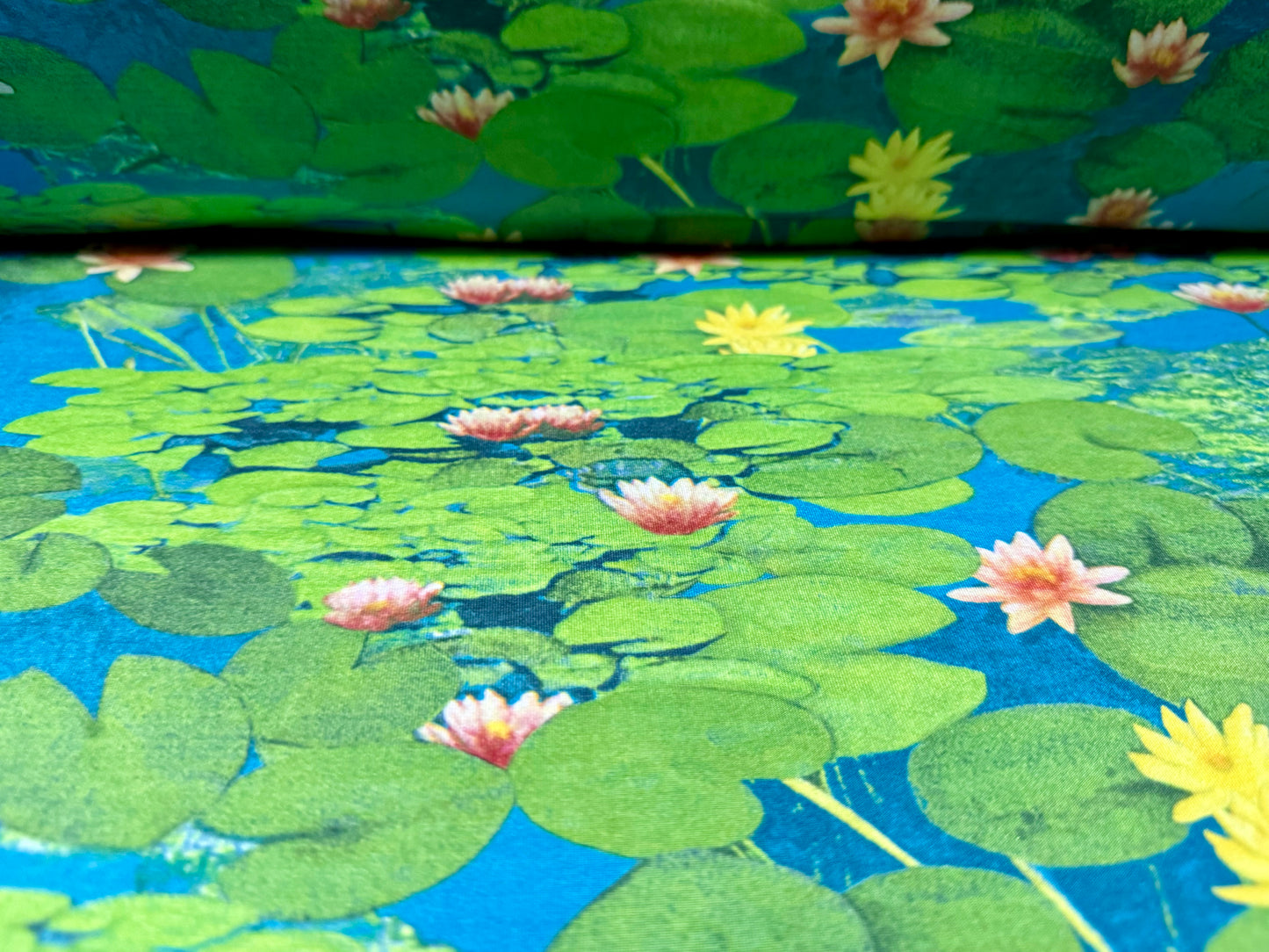 Soft touch stretch spandex single jersey fabric, per metre - water lily print - blue & green