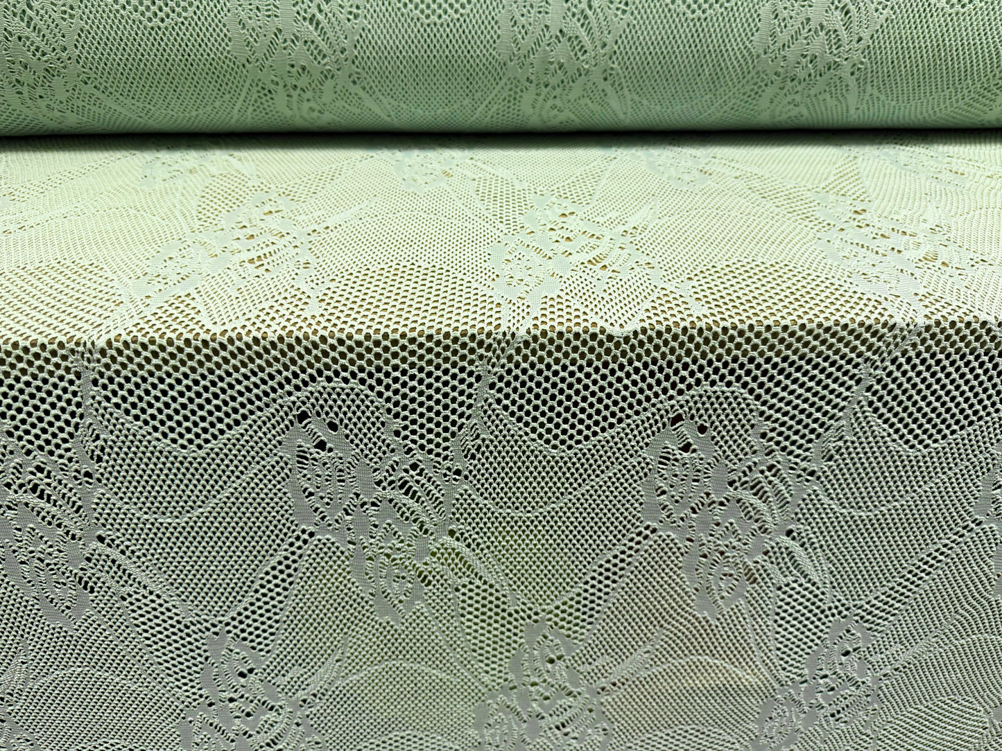 Stretch fishnet jersey fabric with floral design, per metre - mint green