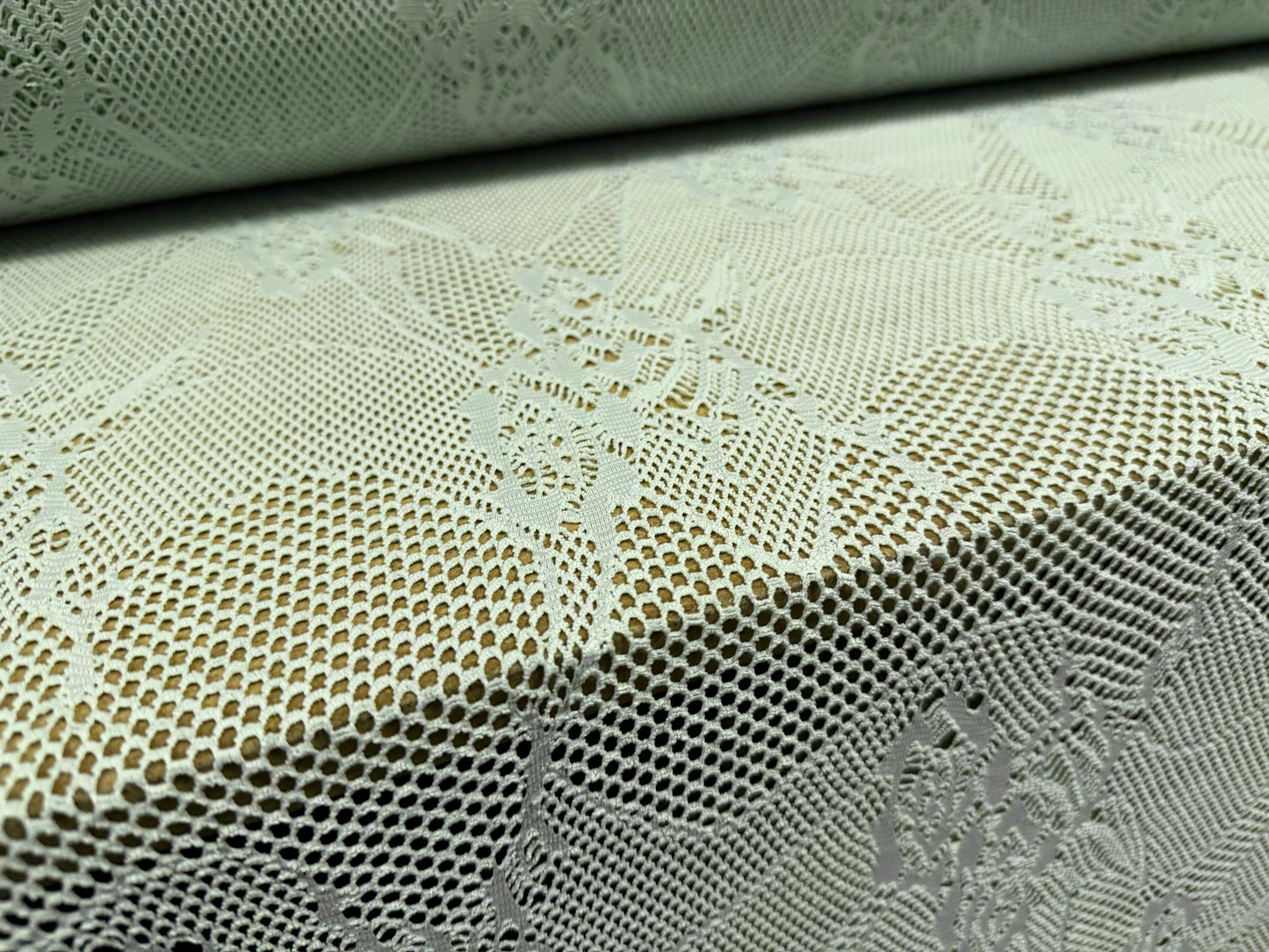 Stretch fishnet jersey fabric with floral design, per metre - mint green