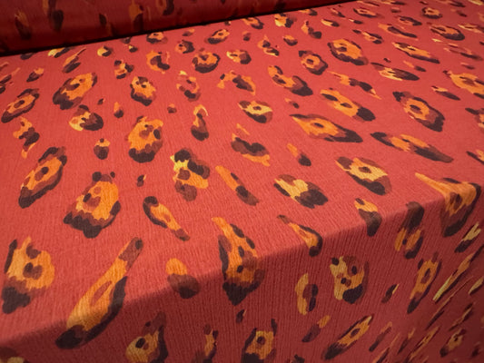 Chiffon yoryu woven dress fabric, per metre -  distressed leopard print - red