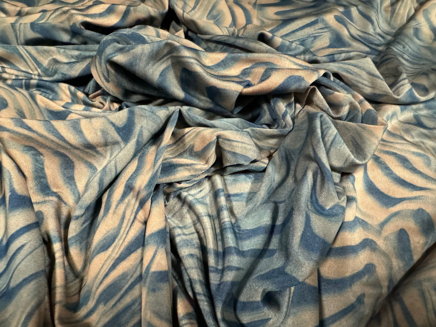 Soft touch stretch spandex single jersey fabric, per metre - stylised wave print - nude & blue